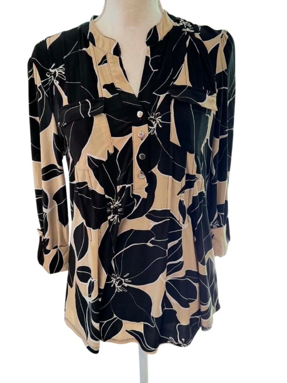 Juniper + Lime floral popover blouse featuring a distinct floral print